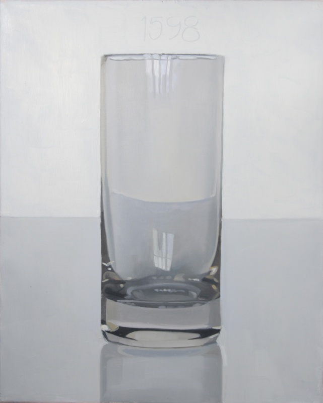 Picture of a tall glass tumbler, meant to represent the glass disposition to break.