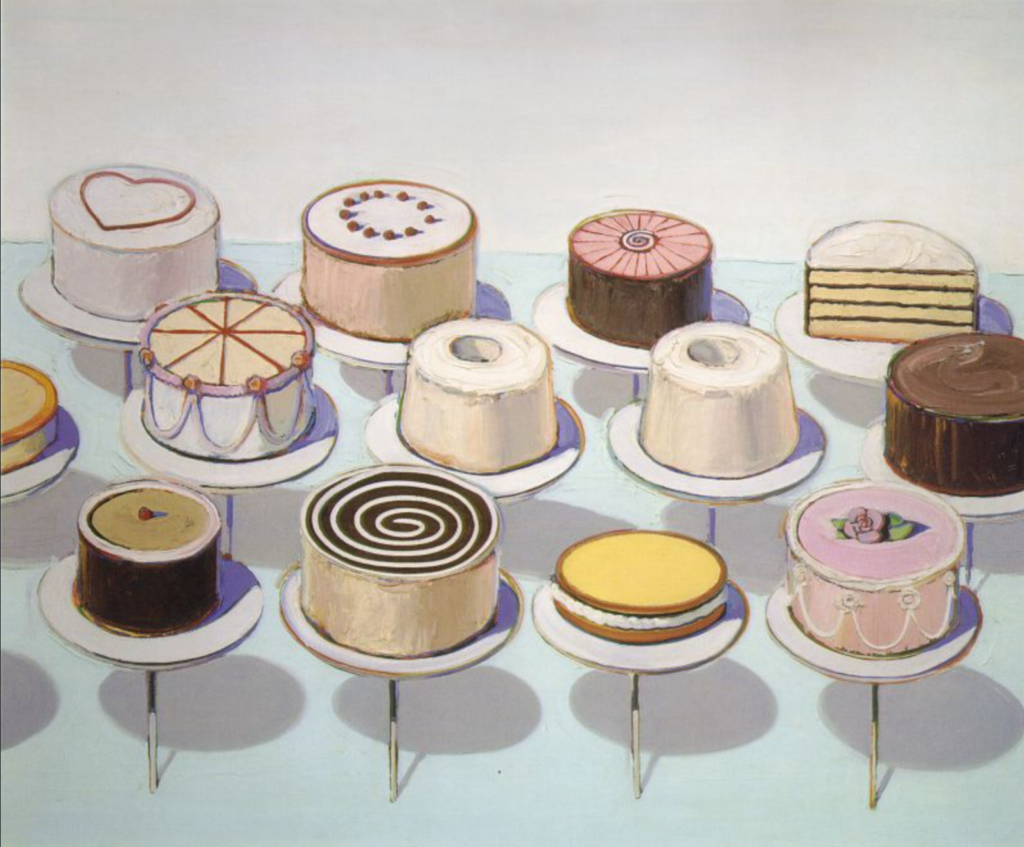 Image of a variety of cakes on display.